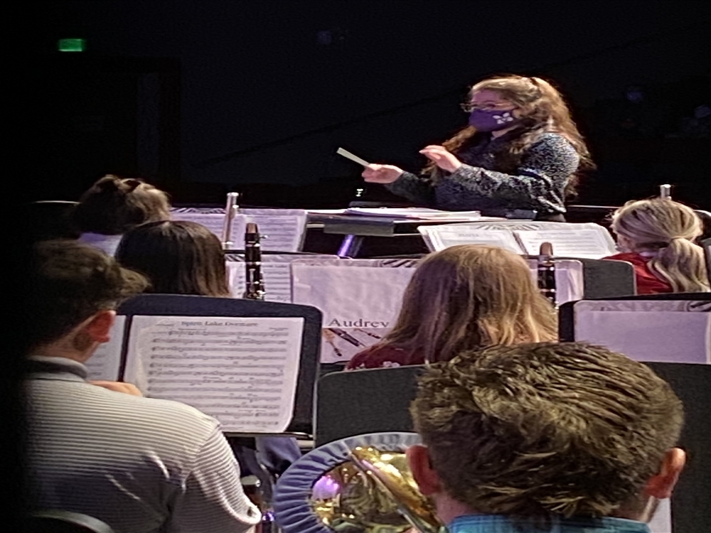 Anna Brown directing student band