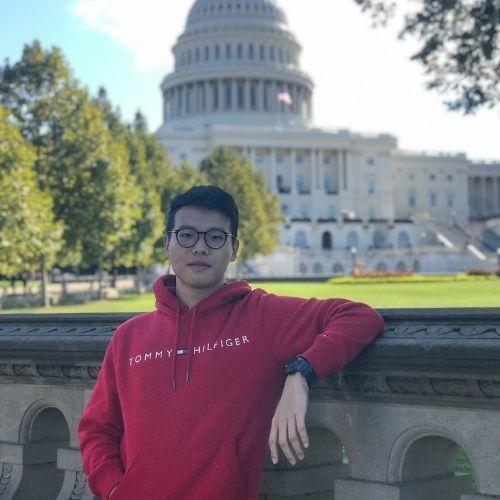 Wai Sum Fung standing in front of the capital building