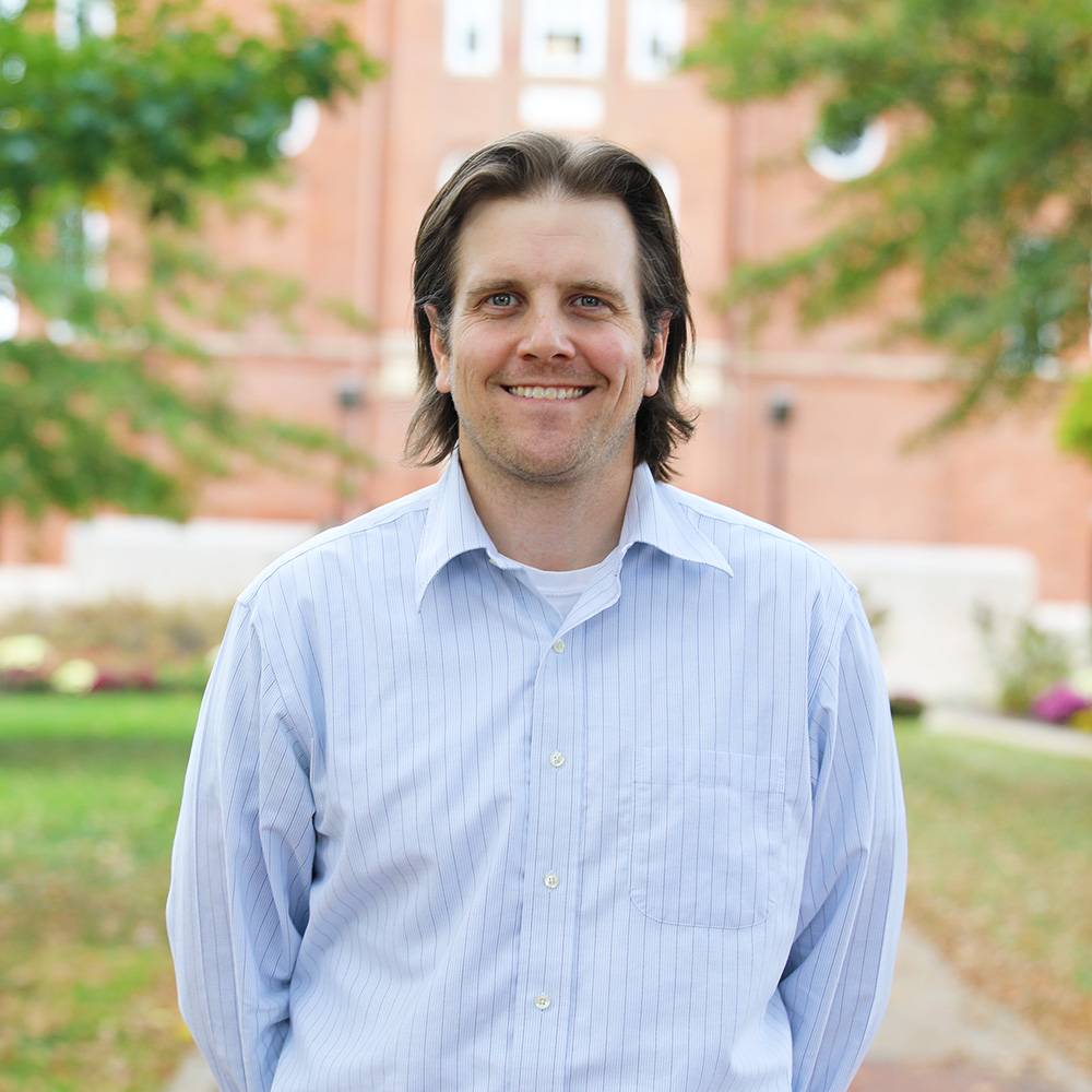 rick bailey in front of chapman