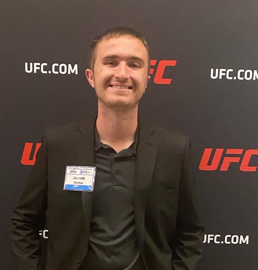 jacob buttar in front of ufc backdrop